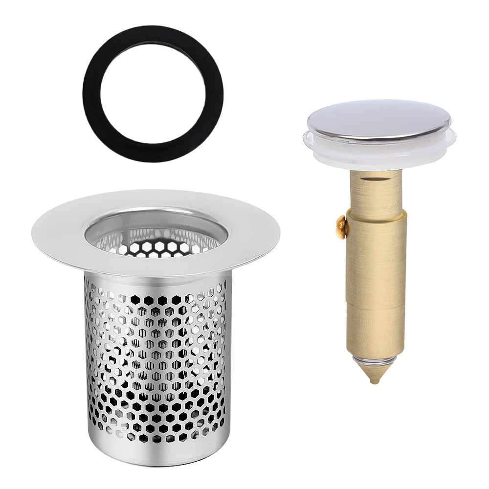 Set of bathroom drain components including a hexagonal drain cover, black rubber washer, and brass drain plug on a white background.